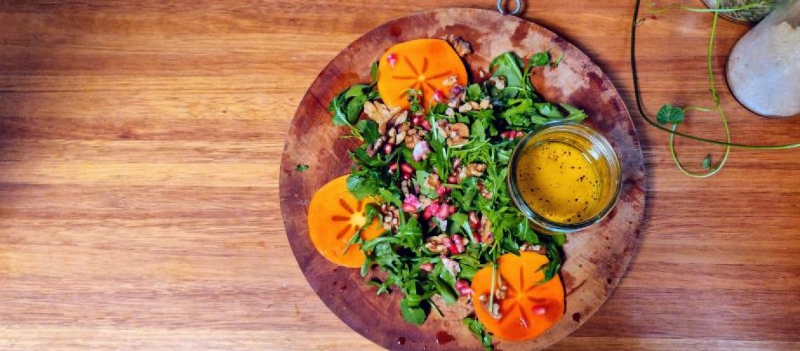 Lisa Fabry Nutrition & Yoga Therapy persimmon, pomegranate, rocket and walnut salad